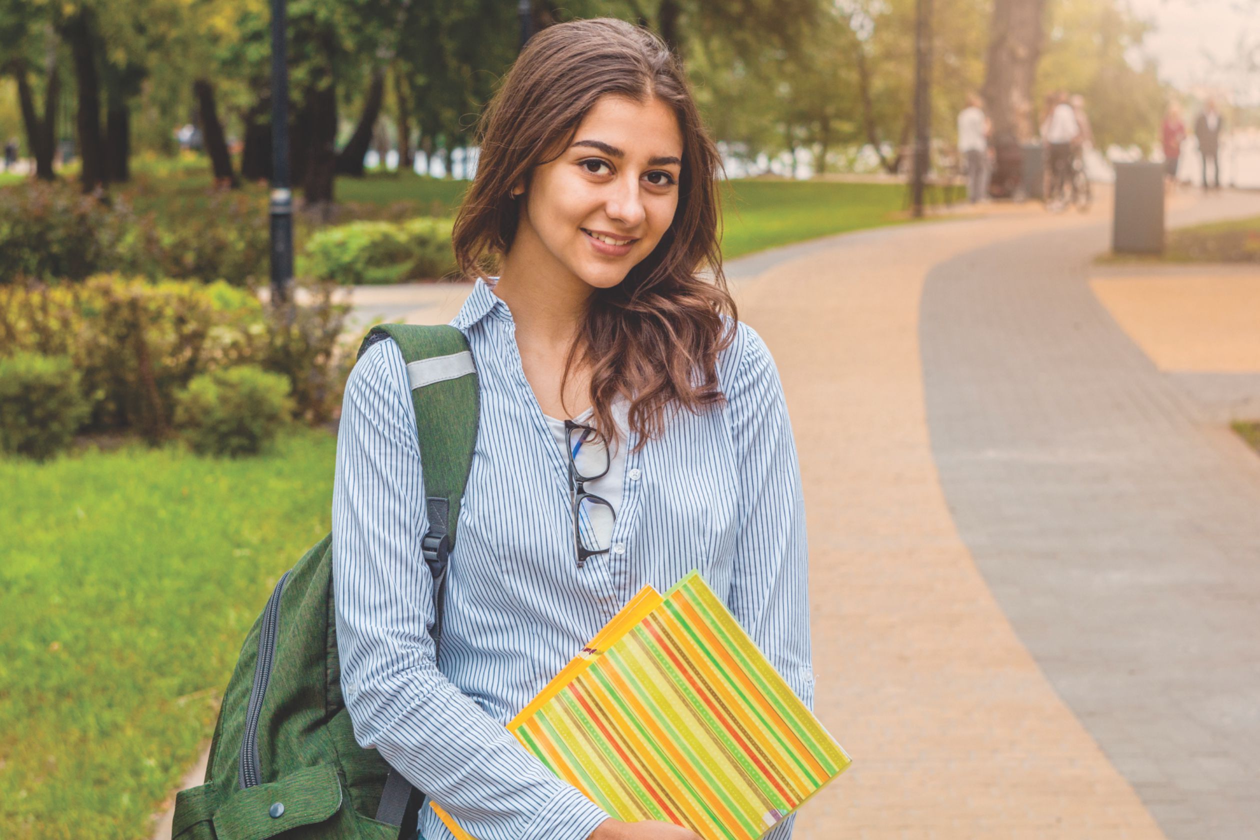 A girl student feels truly happy after receiving expert guidance at Tagore Educons, the best admission consultancy in Patna.